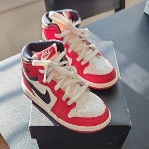 Air Jordan High OG Nike Kids Red, White, and Black Sneakers
